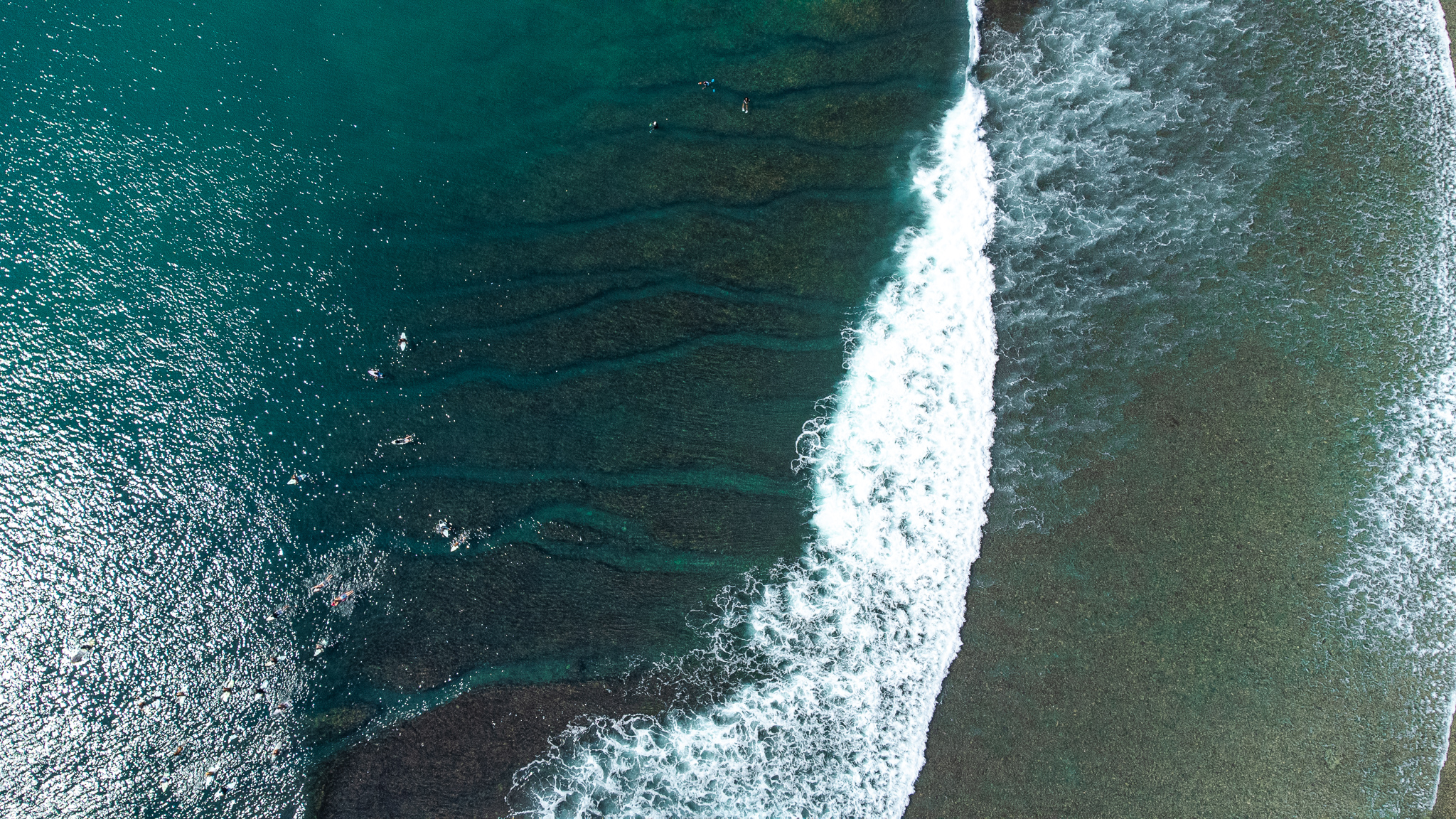 surfing uluwatu drone photo bali indonesia