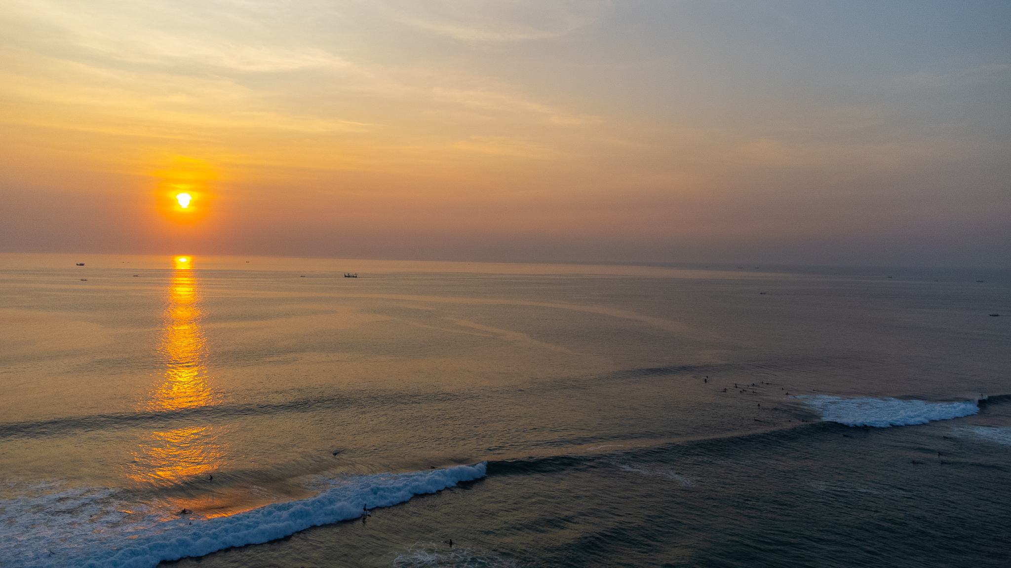 uluwatu indonesia bali sunset drone surfing photo