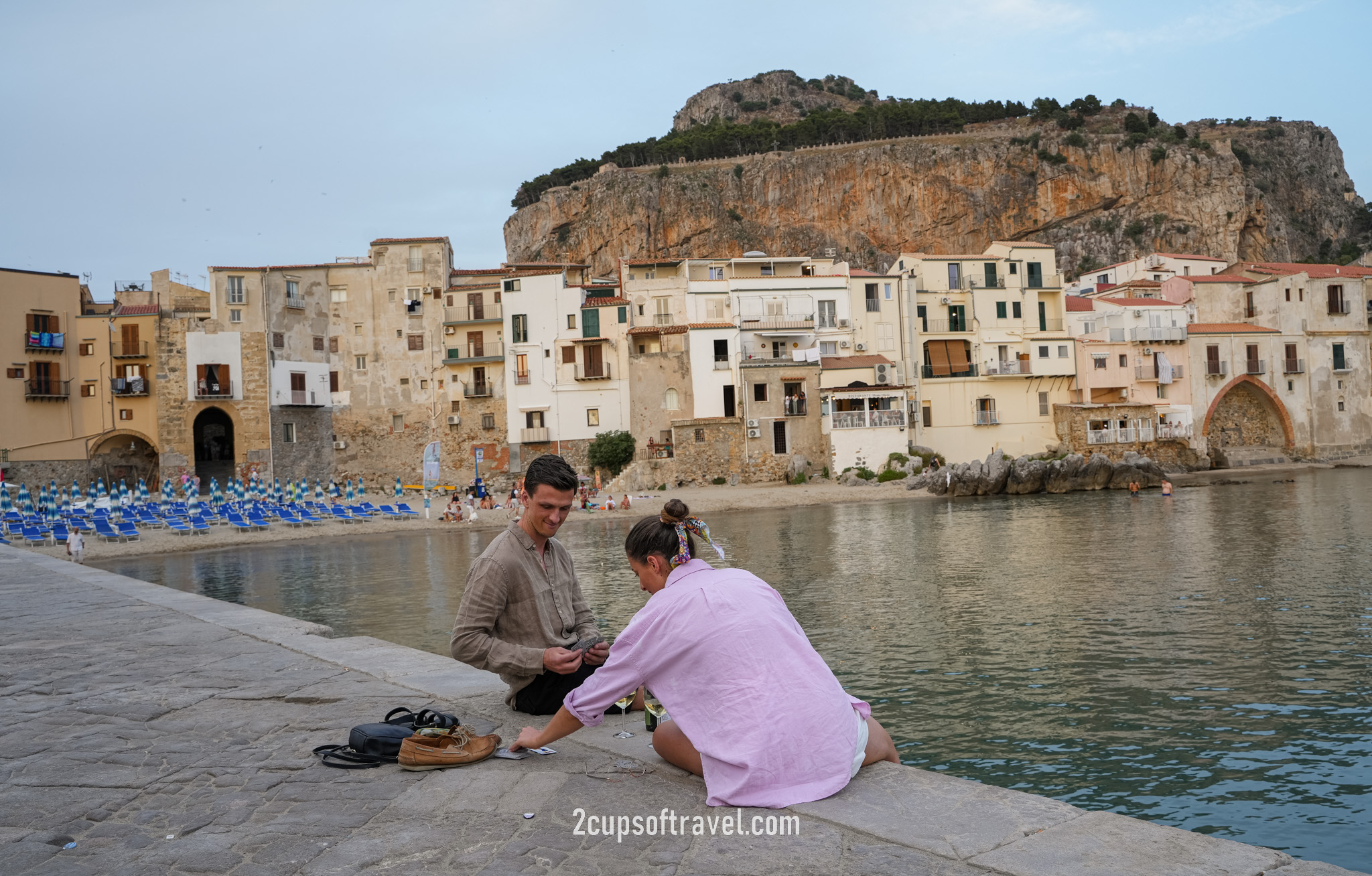 watch the sunset harbour cefalu sicily things to do