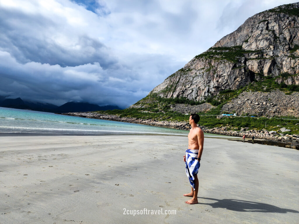 Swim in arctic waters at Rorvikstranda beach henningsvaer best beach lofoten islands