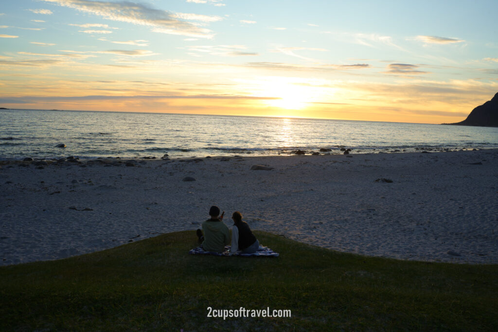 where to watch midnight sun lofoten islands norway Uttakleiv Strand arctic beach