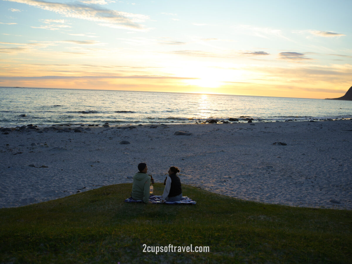 Watching the midnight sun at Uttakleiv Strand - Lofoten Islands