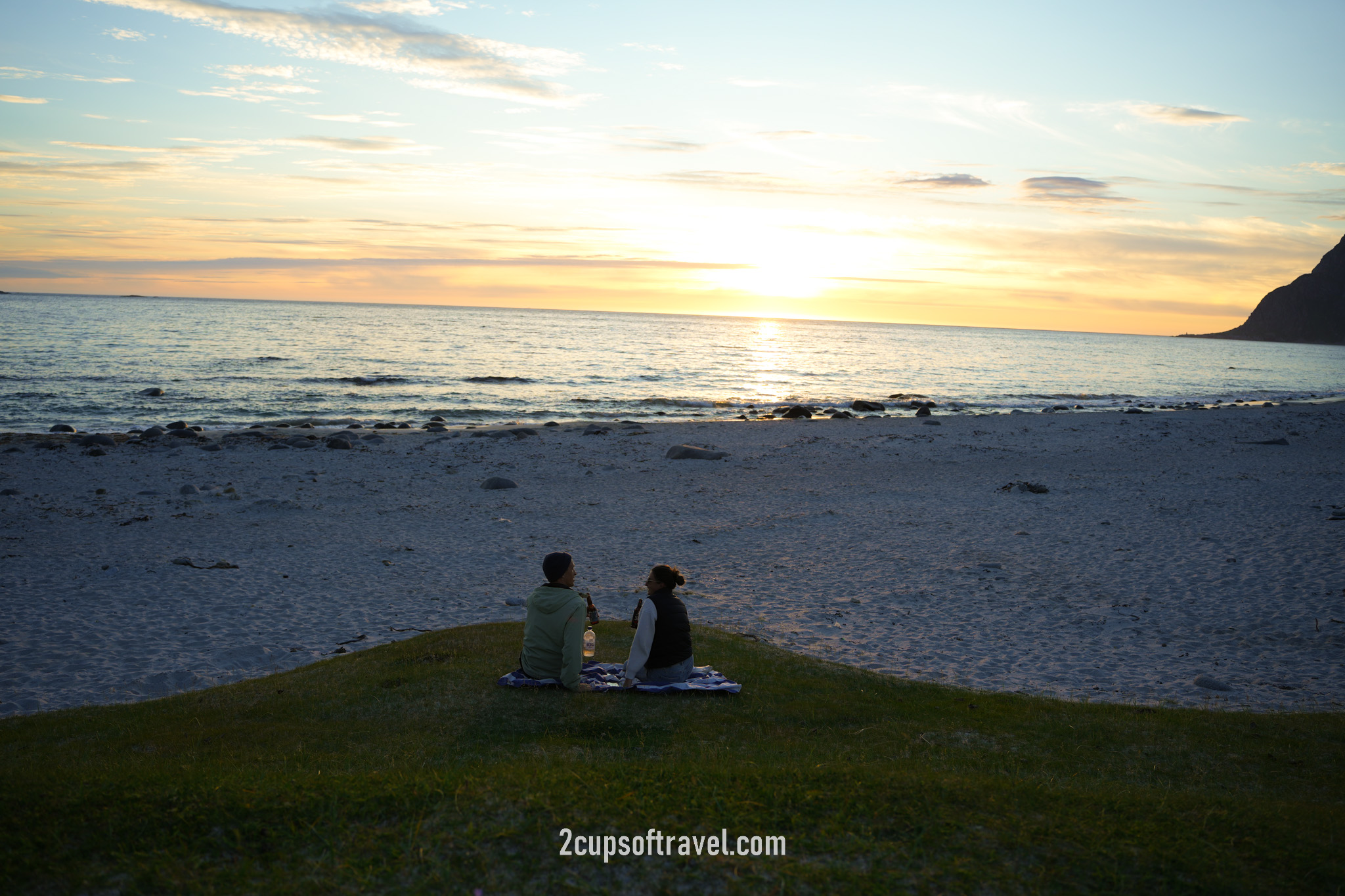 Watching the midnight sun at Uttakleiv Strand - Lofoten Islands