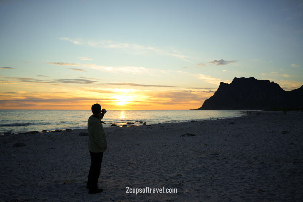 where to watch midnight sun lofoten islands norway Uttakleiv Strand beach