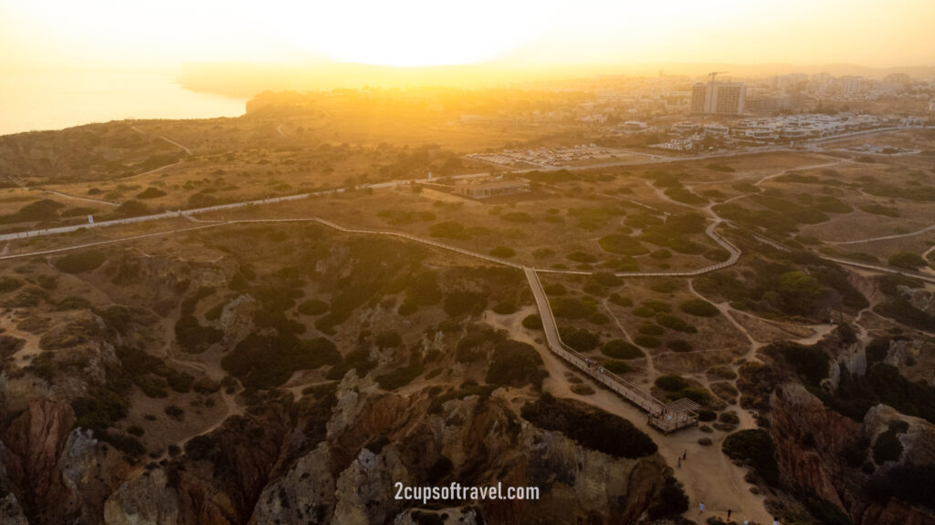 sunset in the algarve lagos portugal drone where to visit best beaches ponta da piedade praia do camillo praia dona ana