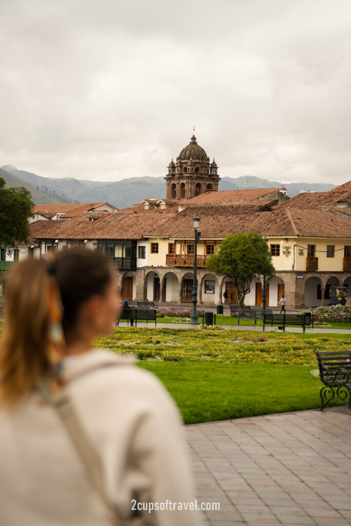 cusco main square people watch things to do guide peru