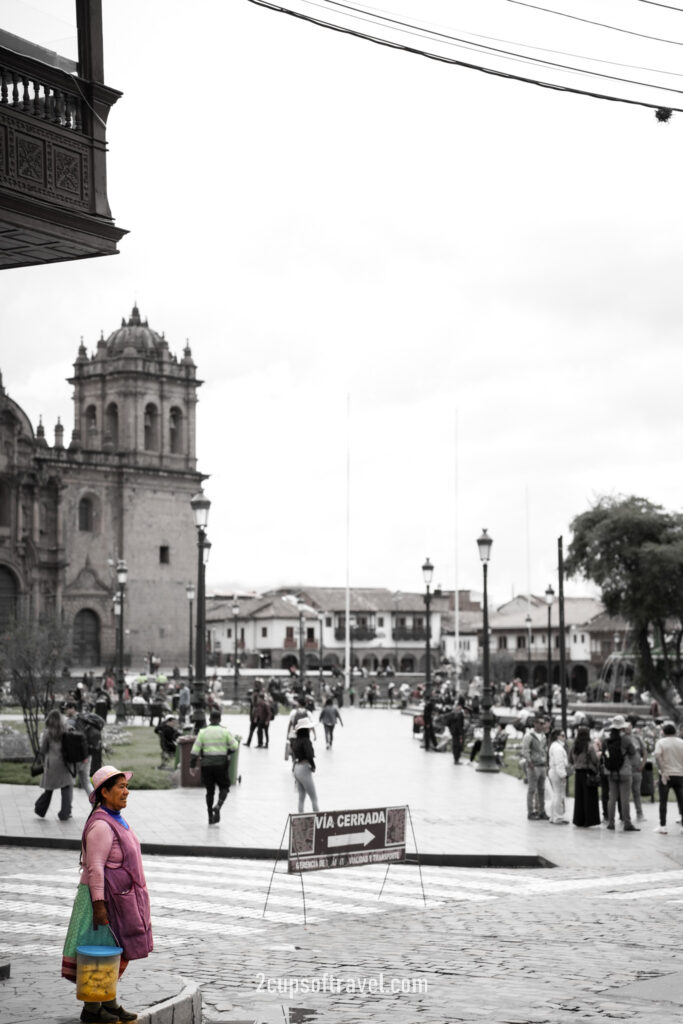 cusco main square people watch things to do guide peru